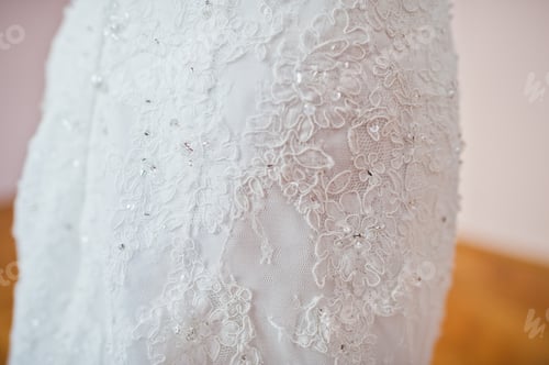 Preview: Elegant white wedding dress at bride morning.