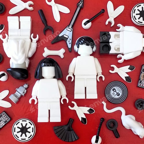 Preview: Creative art ,design made with plastic toys on red background