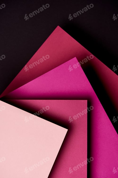 Preview: Paper sheets in pink tones on black background