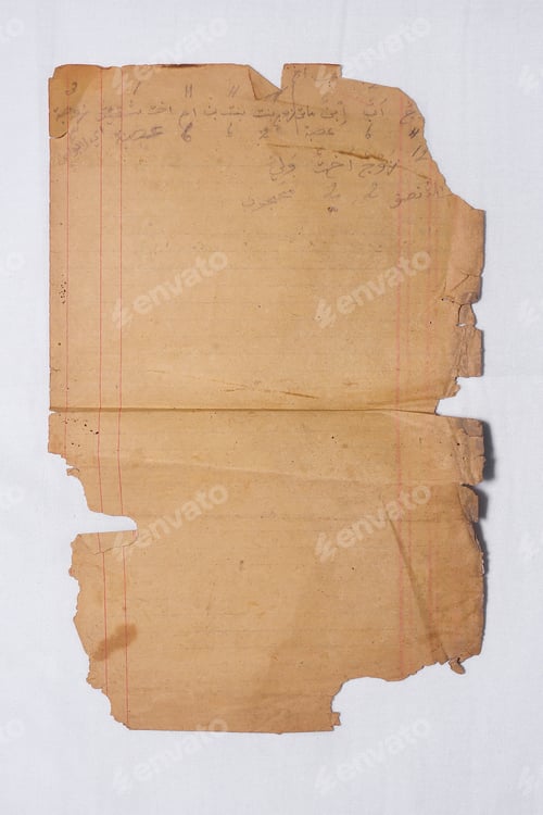 Preview: A torn old sheet of lined paper with faint Arabic handwriting
