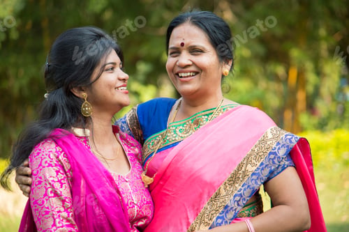 Preview: Portrait of happy mother and daughter embracing.