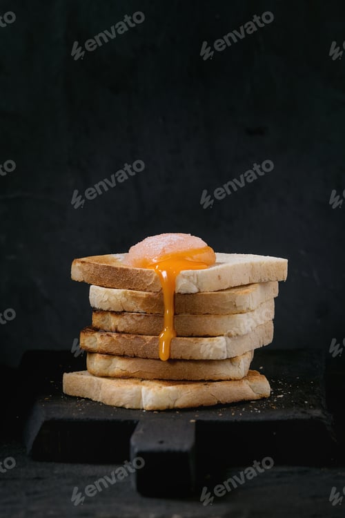 Preview: Toasts with yolk over black