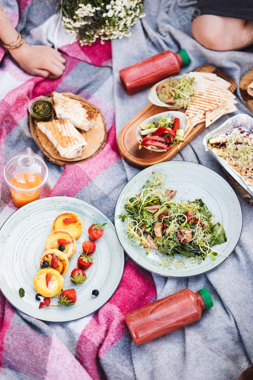 Preview: Close up beautiful picnic with variety of tasty food and smoothi