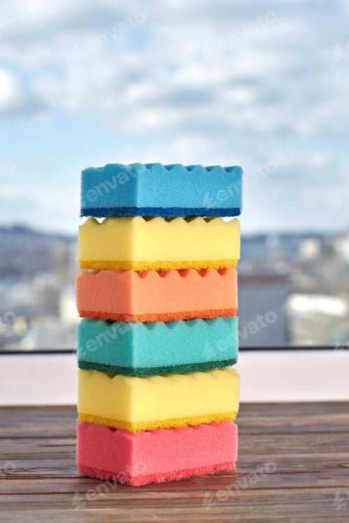 Preview: Stack of multicolored kitchen sponges.