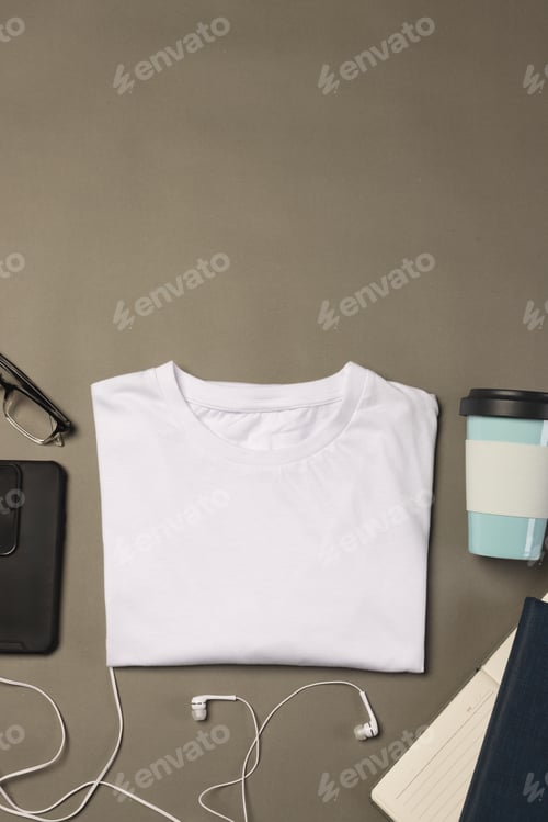 Preview: Flat lay with t-shirt and everyday objects