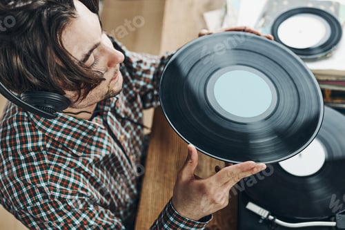Preview: Listening to music from vinyl record. Playing music from analog. Retro music party. Vintage style