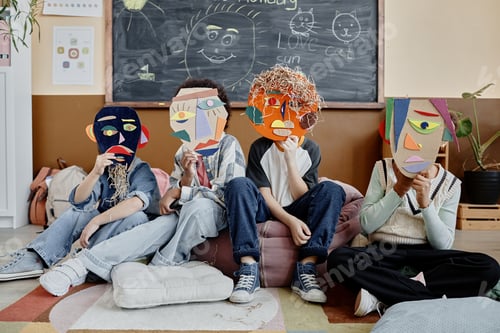 Preview: Kids Holding Handmade Masks in Class