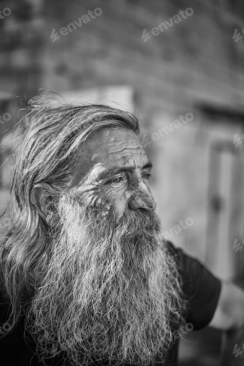 Preview: Close-up shot of an old homeless man's face