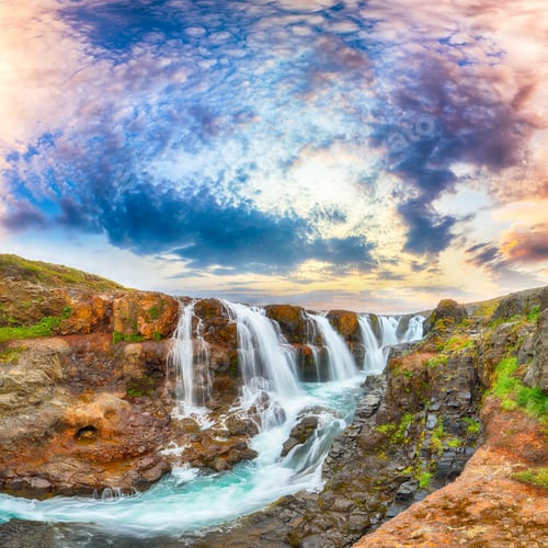 Preview: Breathtaking view of Kolufossar waterfall at sunset.