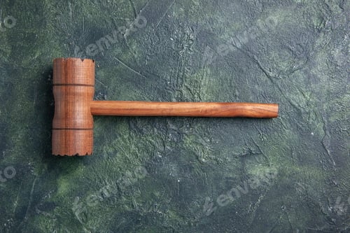 Preview: top view wooden hammer for meat beating on dark background kitchen color wood cutting board photo
