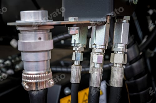Preview: Close up of high-pressure pipe connector on dark background