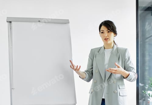 Preview: Young people having a meeting in the office