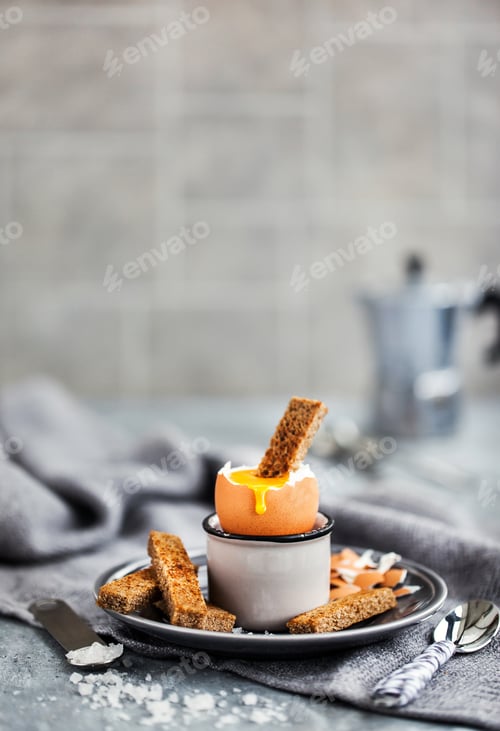 Preview: Soft boiled egg with rye toasts for breakfast