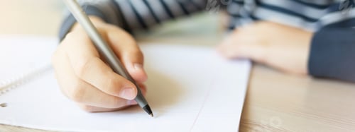 Preview: Kid Writing in Notebook.