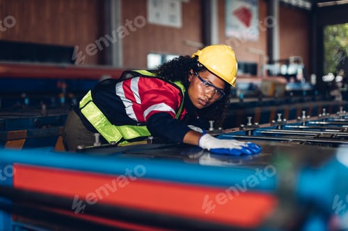 Preview: Foreman or worker work at factory site check up machine or products in site.