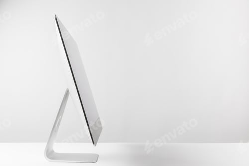 Preview: side view of desktop computer monitor on white