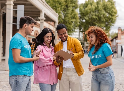 Preview: Couple Signing Up with Volunteers at an Outdoor Event