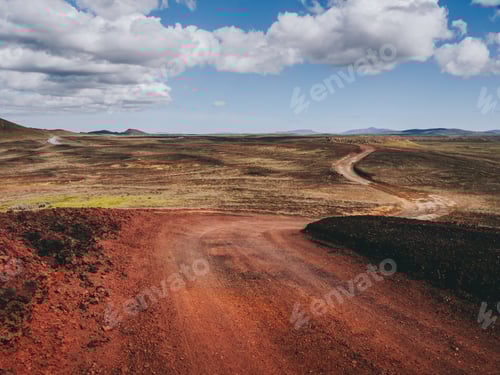 Preview: landscape with road with red volcanic sand in Iceland