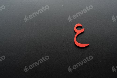 Preview: Image of Arabic letters made of wood on a black background