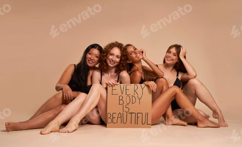 Preview: Group of women in underwear sitting on floor and holding banner