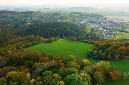 Preview: Autumn colorful trees at sunrise aerial view