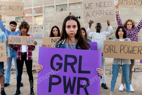 Preview: Group Holding Signs During Outdoor Protest