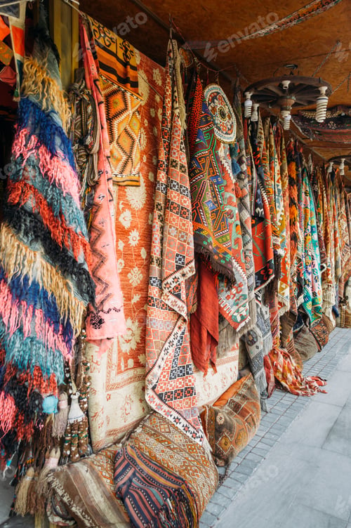 Preview: close up view of different colorful carpets at market in Cappadocia, Turkey