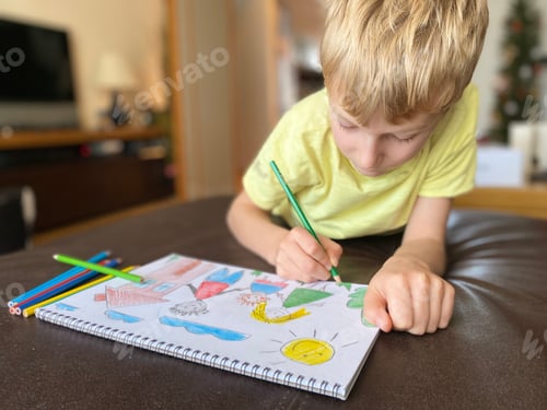 Preview: boy draws his family with colored pencils