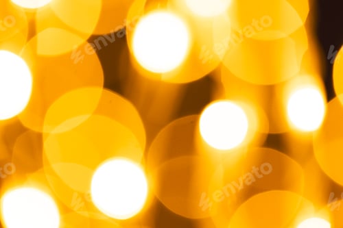 Preview: Multiple yellow bokeh lights with copy space on dark background