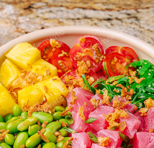 Preview: Fresh tuna poke bowl with colorful ingredients on stone countertop