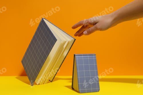 Preview: Two checkered notebooks on a yellow background
