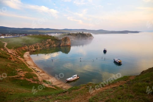 Preview: Lake Baikal, Olkhon Island on a summer evening. View of the Khuzhir Bay near the Shaman rock.
