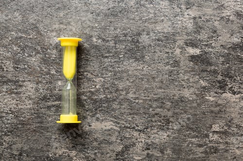Preview: hourglass on the table, sand clock as time passing concept for business deadline, copy space
