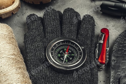 Preview: Still life of tools for hiking or travelling with compass