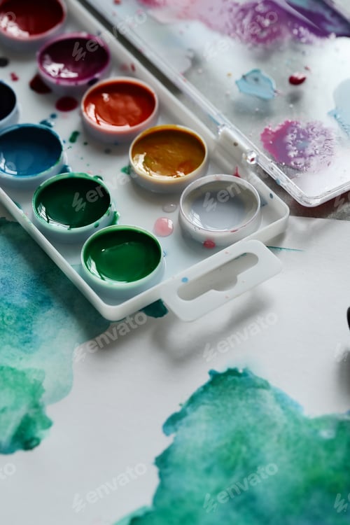 Preview: Watercolor Palette with Green and Blue Paint Swatches