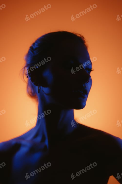 Vorschau: Creative colorful lights play on female body