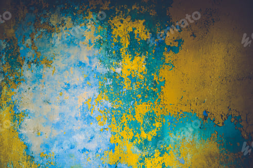Preview: Old blue and yellow rusty iron background with remains of pieces of scraps of old paint.