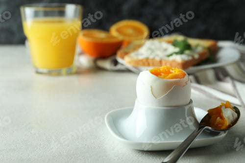Preview: Concept of tasty breakfast with boiled egg, space for text