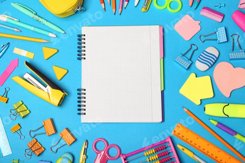Preview: Flat lay composition with different school stationery on color background