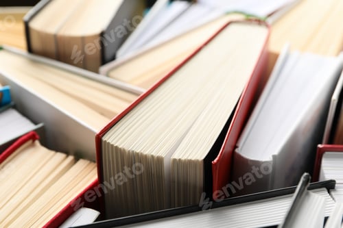 Preview: Many books on whole background, close up. Study concept