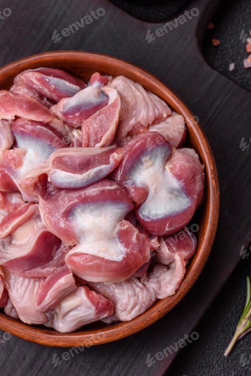 Preview: Raw chicken or turkey gizzards with salt, spices and herbs