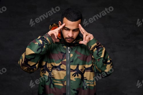 Preview: Handsome African-American guy wear military jacket.
