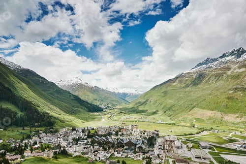 Preview: Elevated view of mountains and valley village, Andermatt, Switzerland