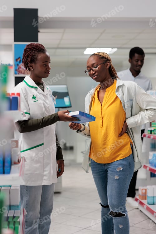 Preview: Customer buying back pain medication in drugstore