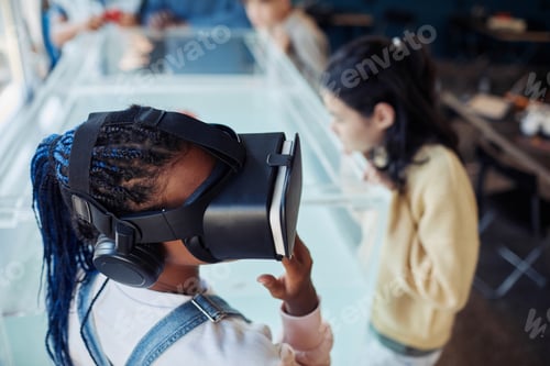 Preview: Girl Wearing VR in Robotics Class