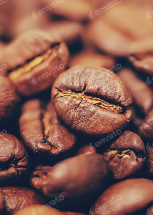 Preview: Coffee beans roasted close-up. Drink. Selective focus.