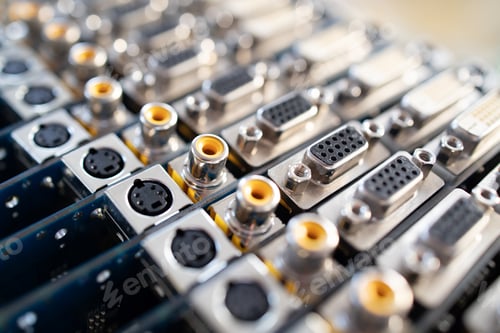 Preview: Close-up blurry metal sockets on a computer video board