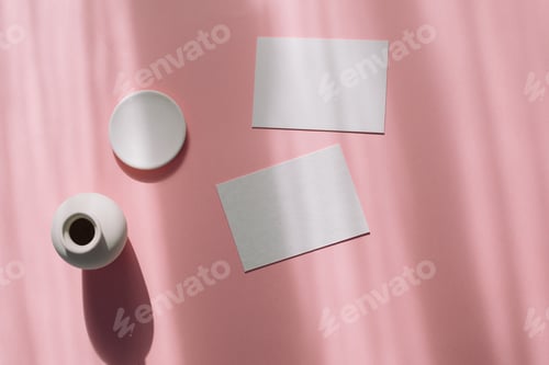 Preview: Top view of business card mock up on shadow background.