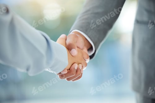 Preview: Cropped shot of two unrecognizable businesspeople shaking hands in an office
