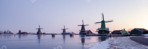 Preview: Zaanse Schans windmill village during winter with snow in the Netherlands